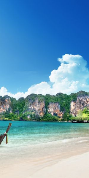 Tropical Seascape Mobile Wallpaper: Thailand's Coastline and Boat