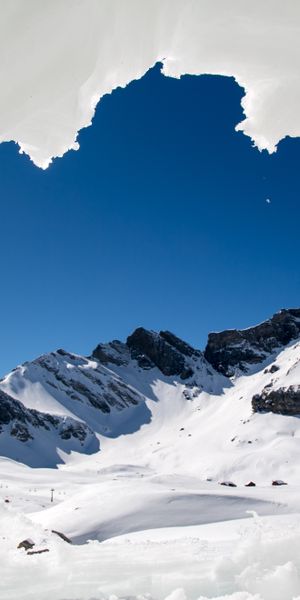 Breathtaking View of Alps Mountains Through Ice