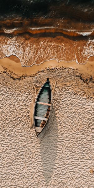 Aerial View of a Beach with a Boat