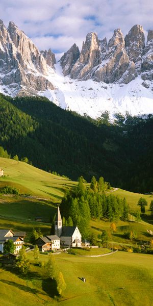 Serene Village Landscape with Majestic Mountains - HD Background