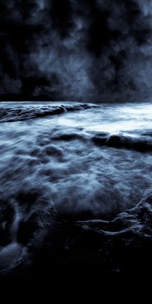Enchanting Night Ocean with Moon and Clouds Background