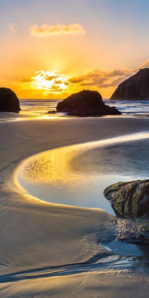 Breathtaking Sunset Over the Ocean Rocks