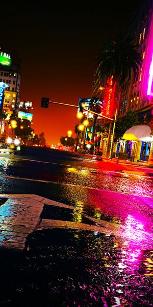 Explore the Vibrant Night Cityscape of Grand Theft Auto V - 4K Mobile Wallpaper
