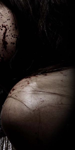 Intense Dark Vampire with Blood Splatter Wallpaper