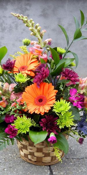 Beautiful HD Mobile Wallpaper Featuring a Colorful Floral Basket Arrangement