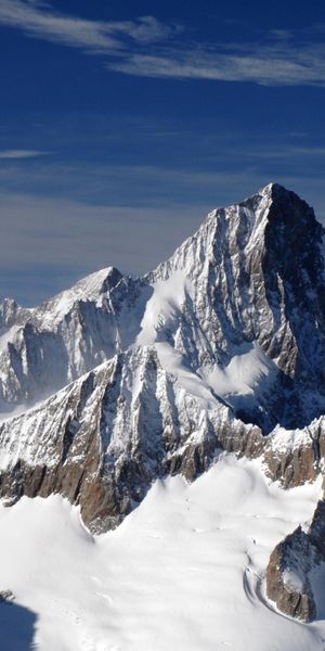 Breathtaking mountain scenery phone wallpaper featuring snow-capped peaks