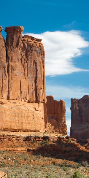 Majestic Monument Valley Cliffs Against Blue Sky