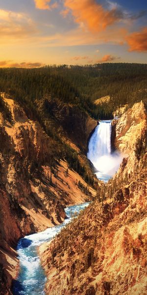 Breathtaking Waterfall in Yellowstone National Park at Sunset