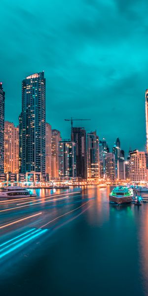 Captivating Night City Wallpaper with Skyscrapers and Port Views