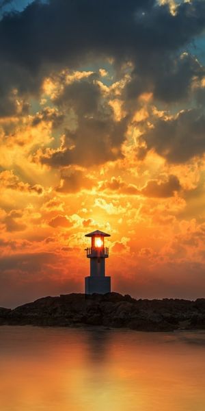 Phone wallpaper: Sunset, Sea, Building, Ocean, Lighthouse, Cloud, Sunbeam, Man Made free download