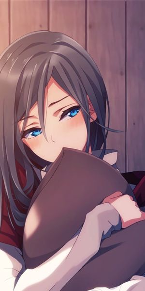Charming Anime Girl Sitting Comfortably with a Pillow