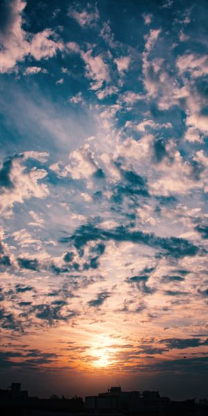 Breathtaking Sunset with Dramatic Clouds in the Sky