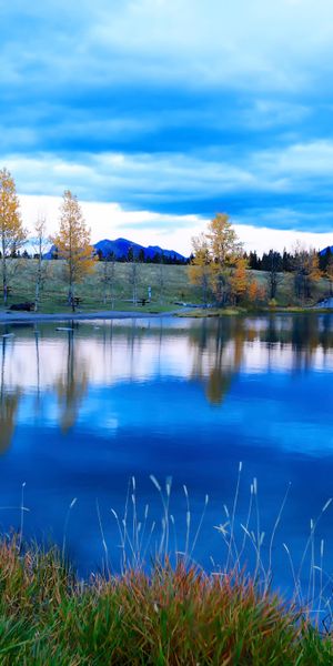 Beautiful Lake with Mountain Reflections and Autumn Foliage