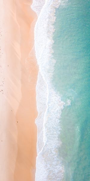 Breathtaking Aerial Beach View with Waves