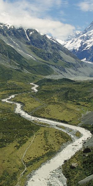 Snow-Capped Mountain Valley Background