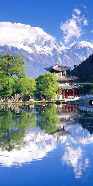 Beautiful Japanese Landscape with Scenic Bridge Over a Tranquil Lake