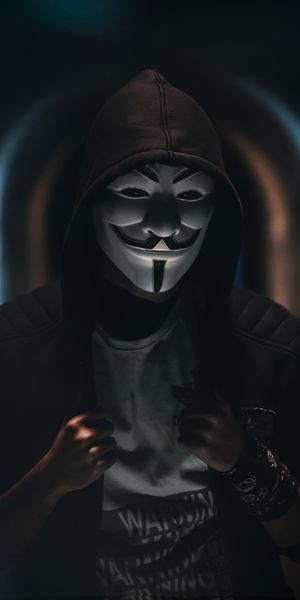 Mysterious Anonymous Figure in Dark Hoodie