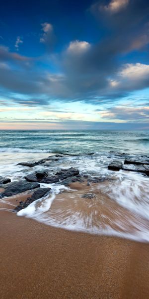 Beautiful Coastal Waves at Sunset