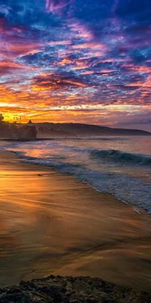 Breathtaking Coastal Sunset Mobile Wallpaper: Ocean, Beach, and Sky