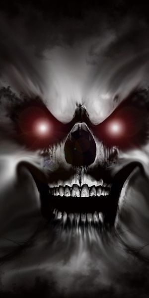 Eerie Dark Skull with Glowing Eyes Phone Wallpaper