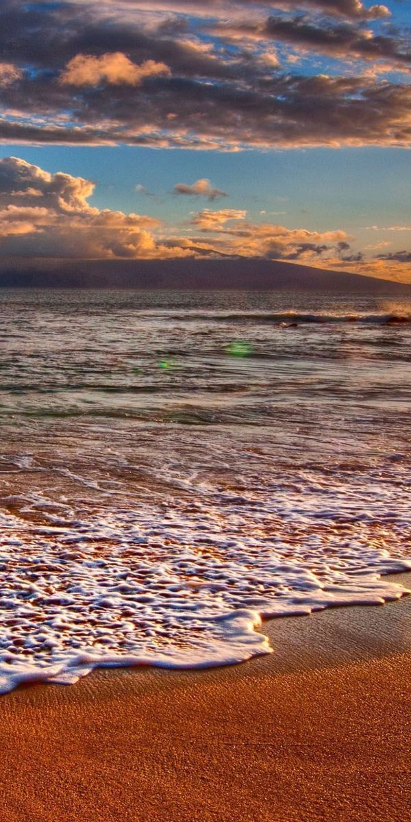 Breathtaking High-Quality Phone Wallpaper of a Beach Sunrise Over the Ocean