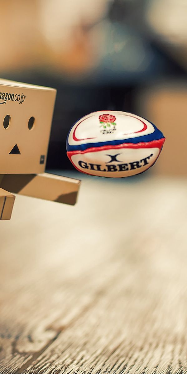 Charming Danbo Character Engaged in Rugby - Ideal 4K Phone Wallpaper