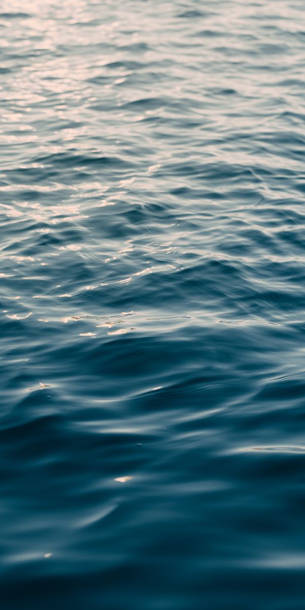 Smooth Ripples Over Calm Sea Water