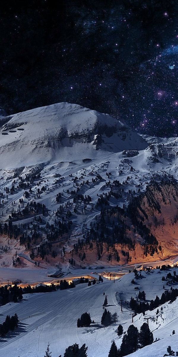 Serene Winter Landscape with Milky Way Over a Village