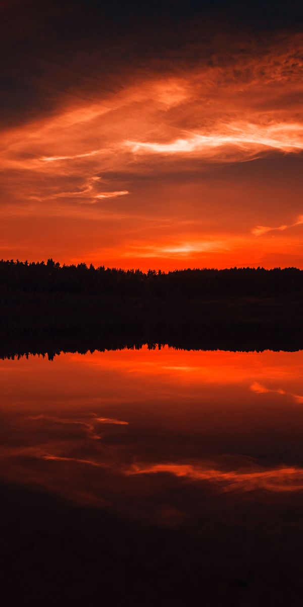 Captivating 4K phone wallpaper of a twilight river at sunset