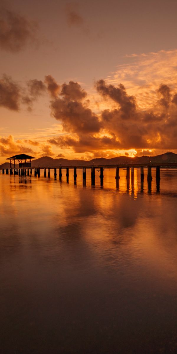 Breathtaking Sunset Landscape with Pier and Sea