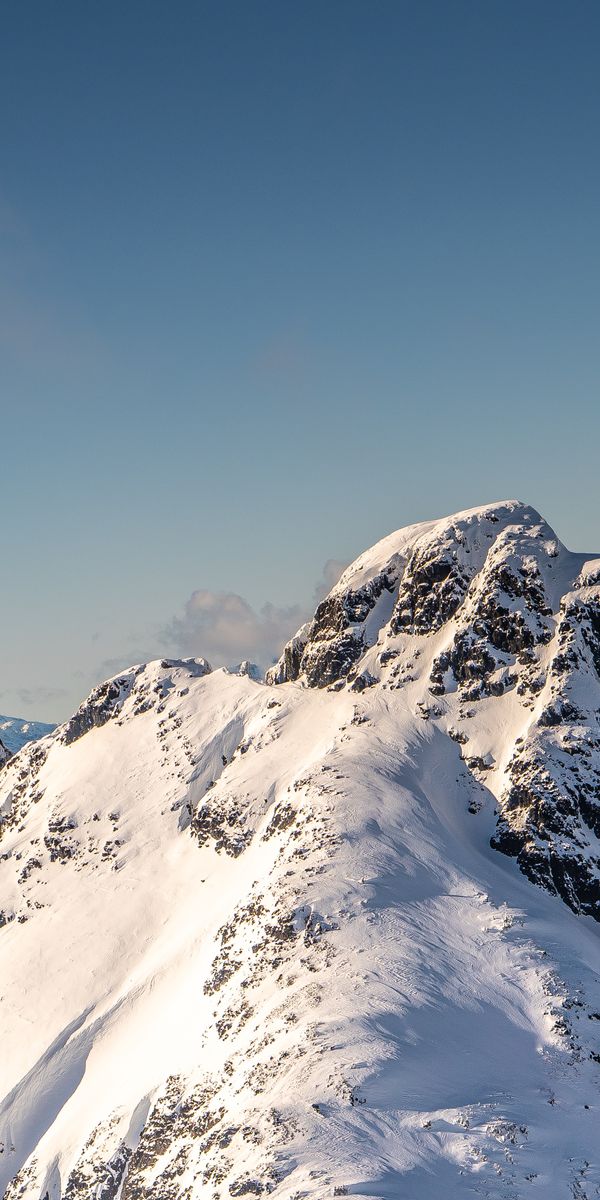 Breathtaking Snow-Covered Mountain Peaks for Your Phone Wallpaper