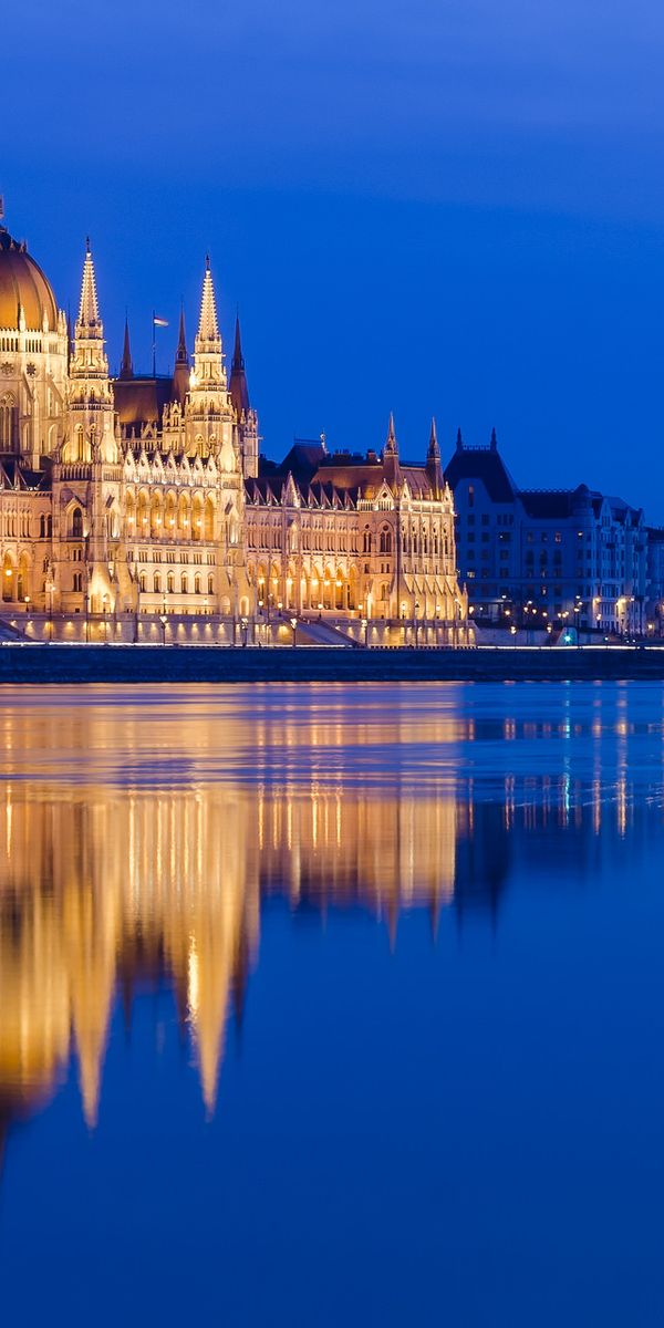 Hungarian Parliament Building at Night: A Reflection on the Danube
