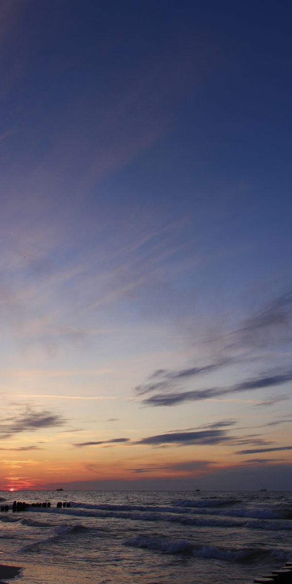 Serene Twilight Beach Wallpaper: Waves, Sunset, and Nature's Beauty