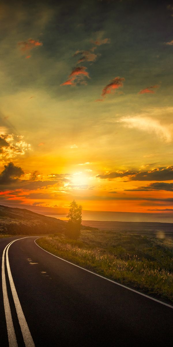 Captivating 4K Wallpaper: Winding Road Under a Vibrant Sunset Sky