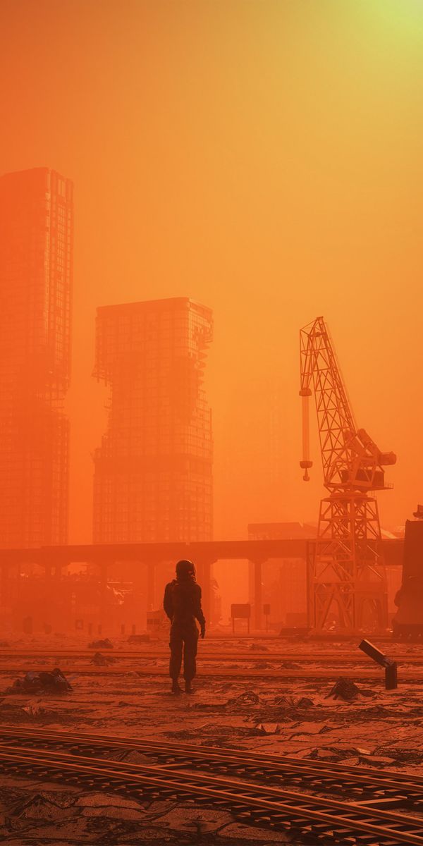 Futuristic City with Human Silhouette Against an Orange Sky