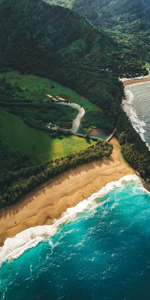 Breathtaking Aerial View of Kauai's Beach and Ocean