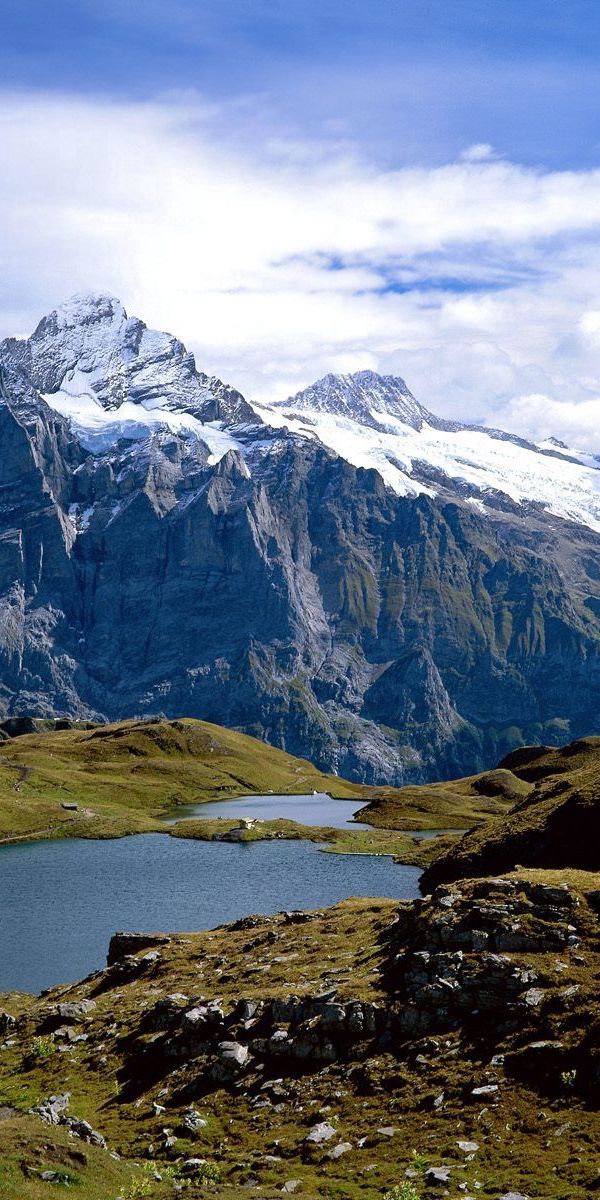 Phone wallpaper: Grass, Stones, Mountains, Lake, Nature, Switzerland free download
