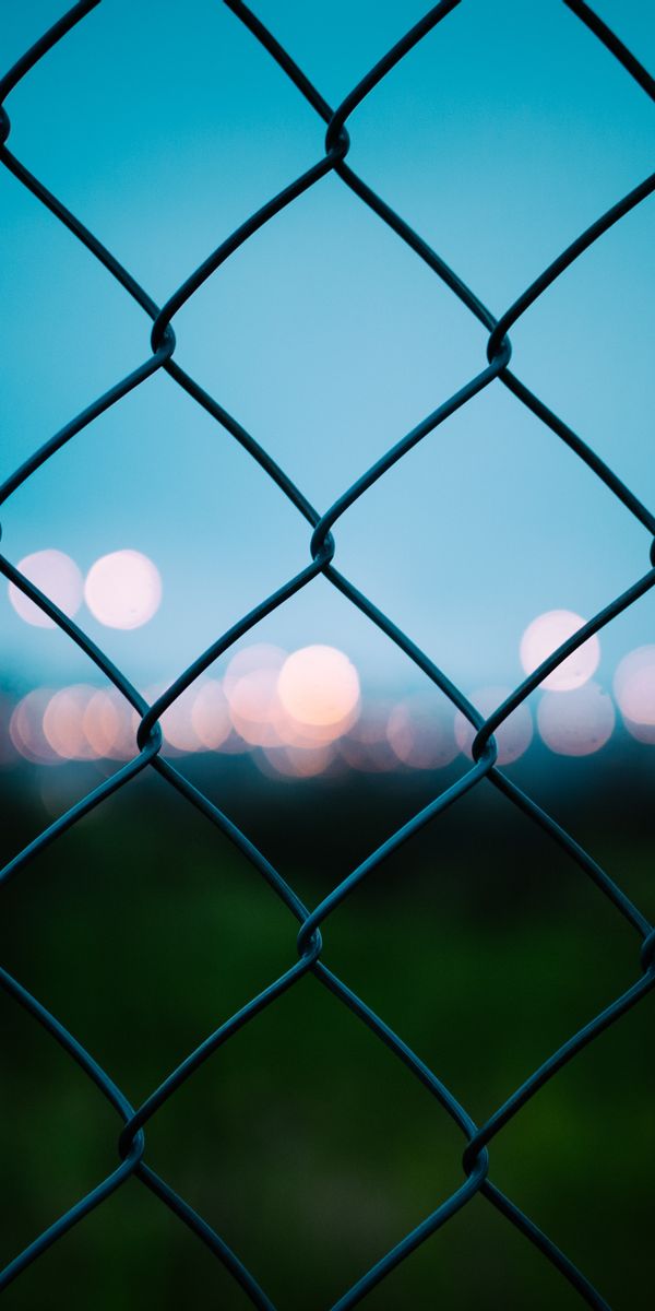 Amazing Bokeh Effect Behind a Fence