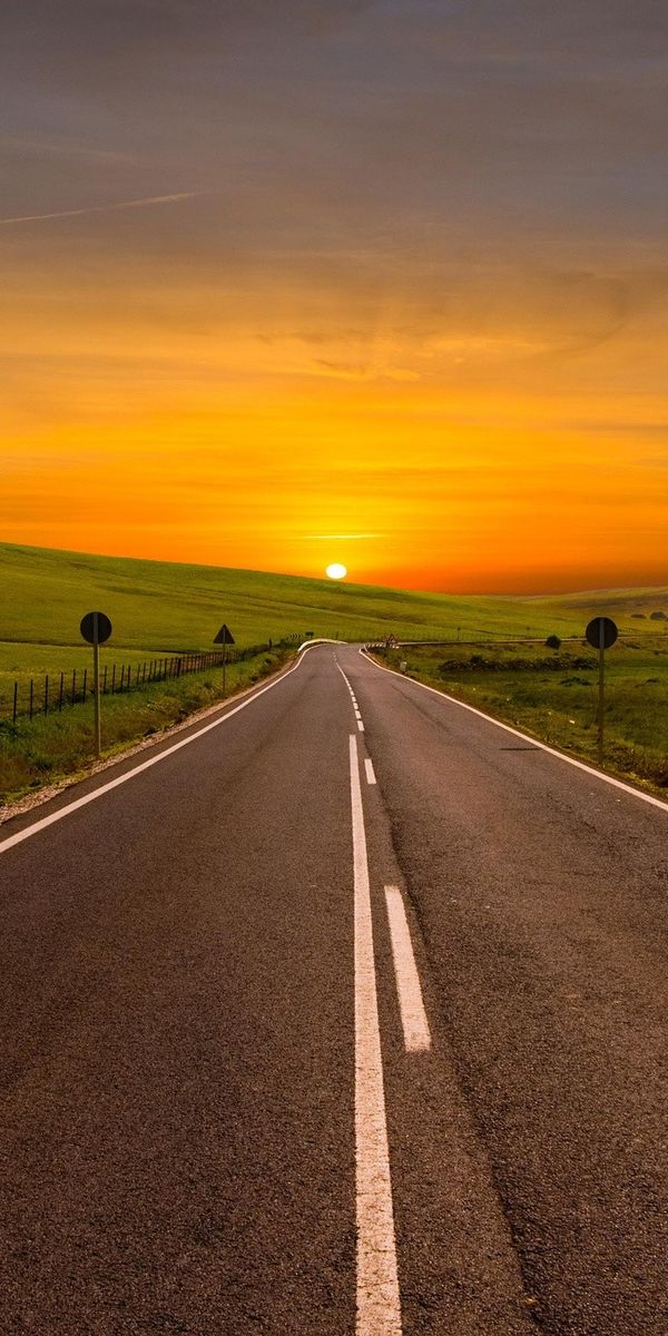 Breathtaking Sunset Over a Serene Road