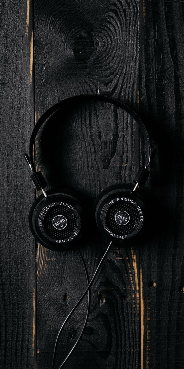 Stylish Black Headphones on Dark Wooden Surface