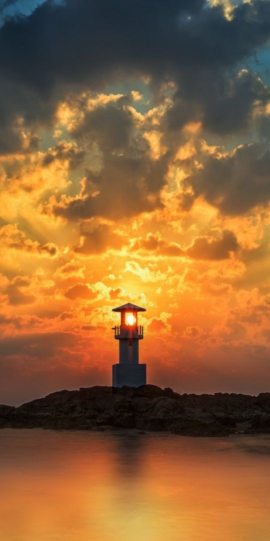 Phone wallpaper: Sunset, Sea, Building, Ocean, Lighthouse, Cloud, Sunbeam, Man Made free download