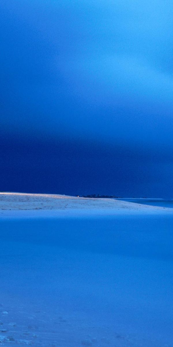 Serene Ocean Beach Night Scene Wallpaper