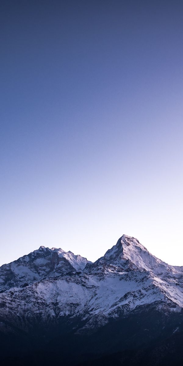 Majestic Snow-Capped Mountains at Dusk