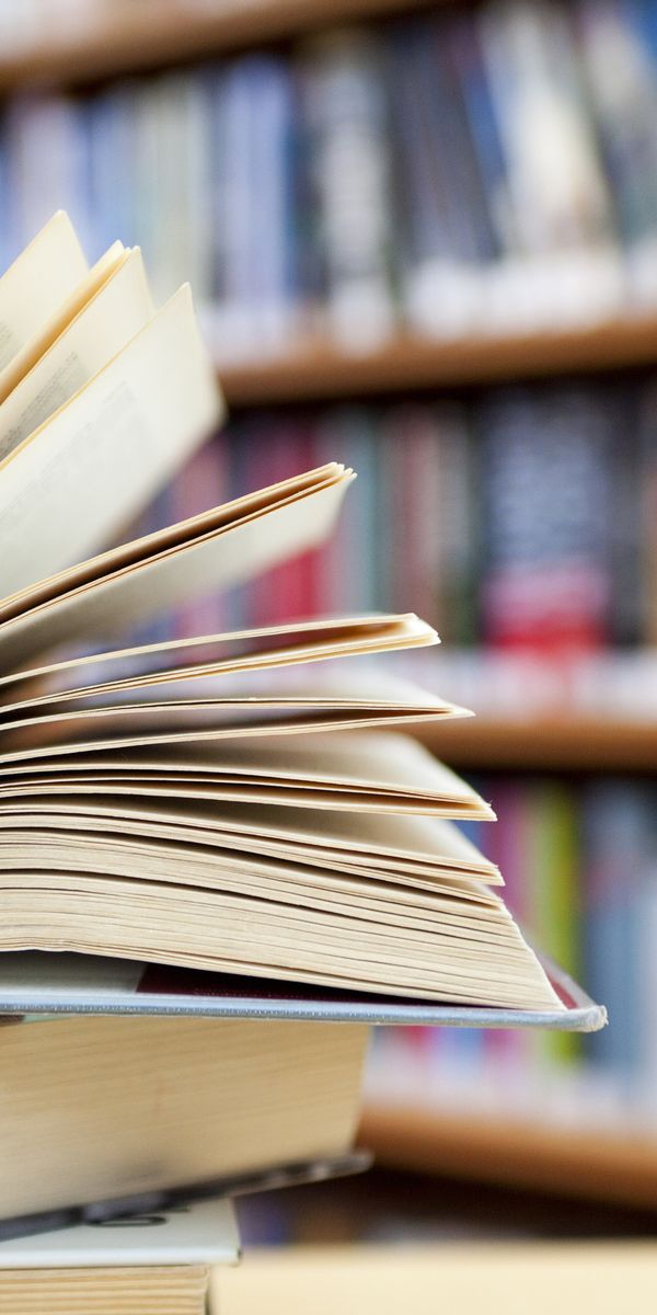 Close-Up of an Open Book in a Library