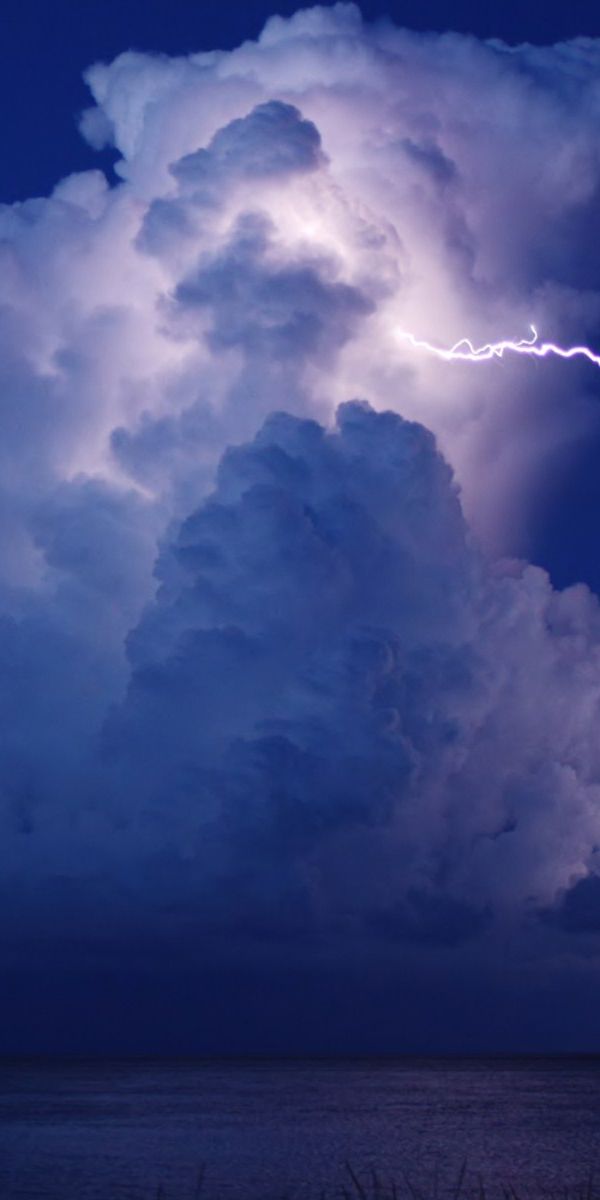 Mesmerizing Night Lightning Over the Ocean