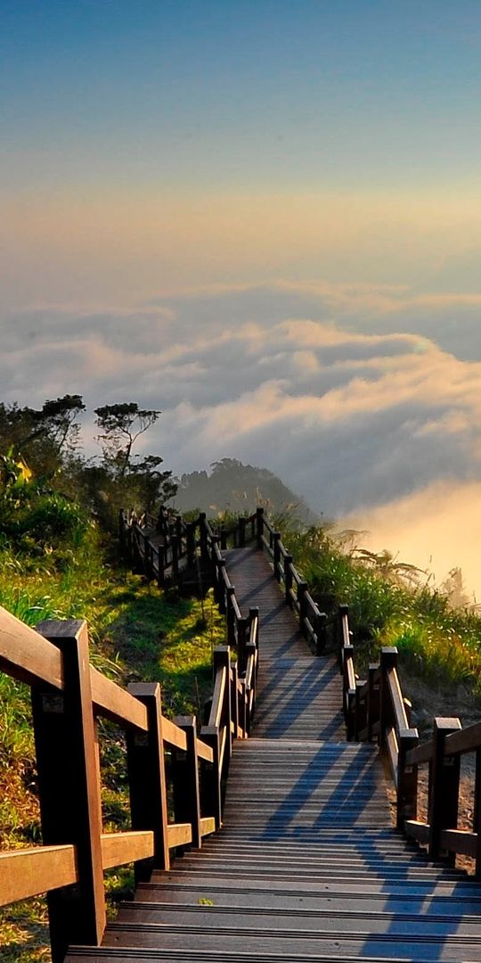 Cool Sunrise Over Cloudy Landscape with Wooden Steps