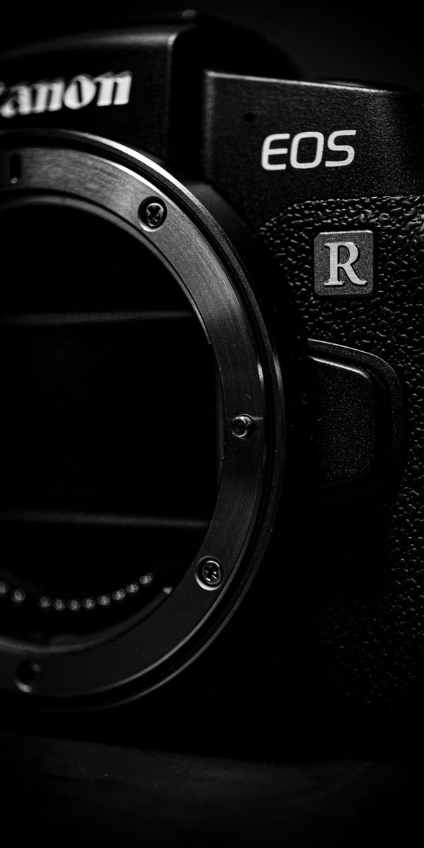 Elegant Black Camera Wallpaper: Perfect for iPhone and Tech Lovers