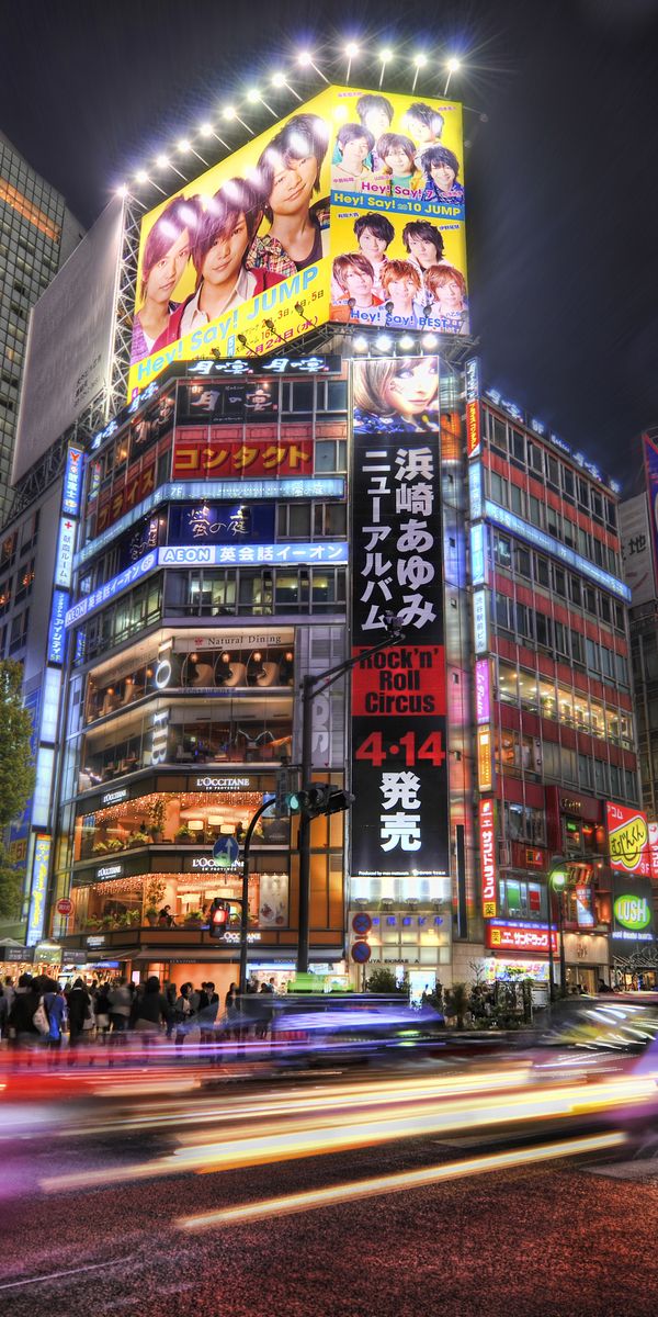 Captivating Tokyo Nightlife: Billboards and Bustling Streets for Phone Wallpaper