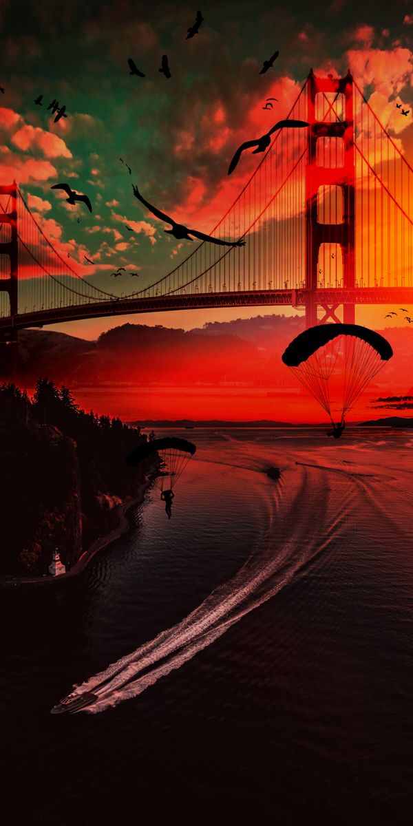 Breathtaking View of Parachutists Over Golden Gate at Sunset
