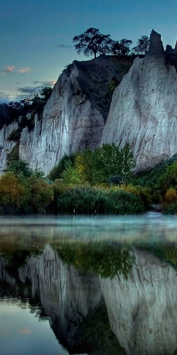 Breathtaking Cliff and Lake Reflection - Perfect iPhone Wallpaper
